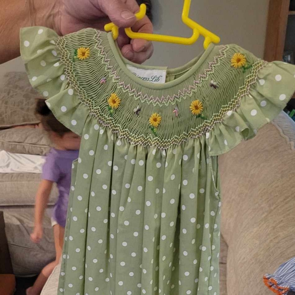 Beautiful sunflower smocked dress. Light green, white polka-dots. Never worn